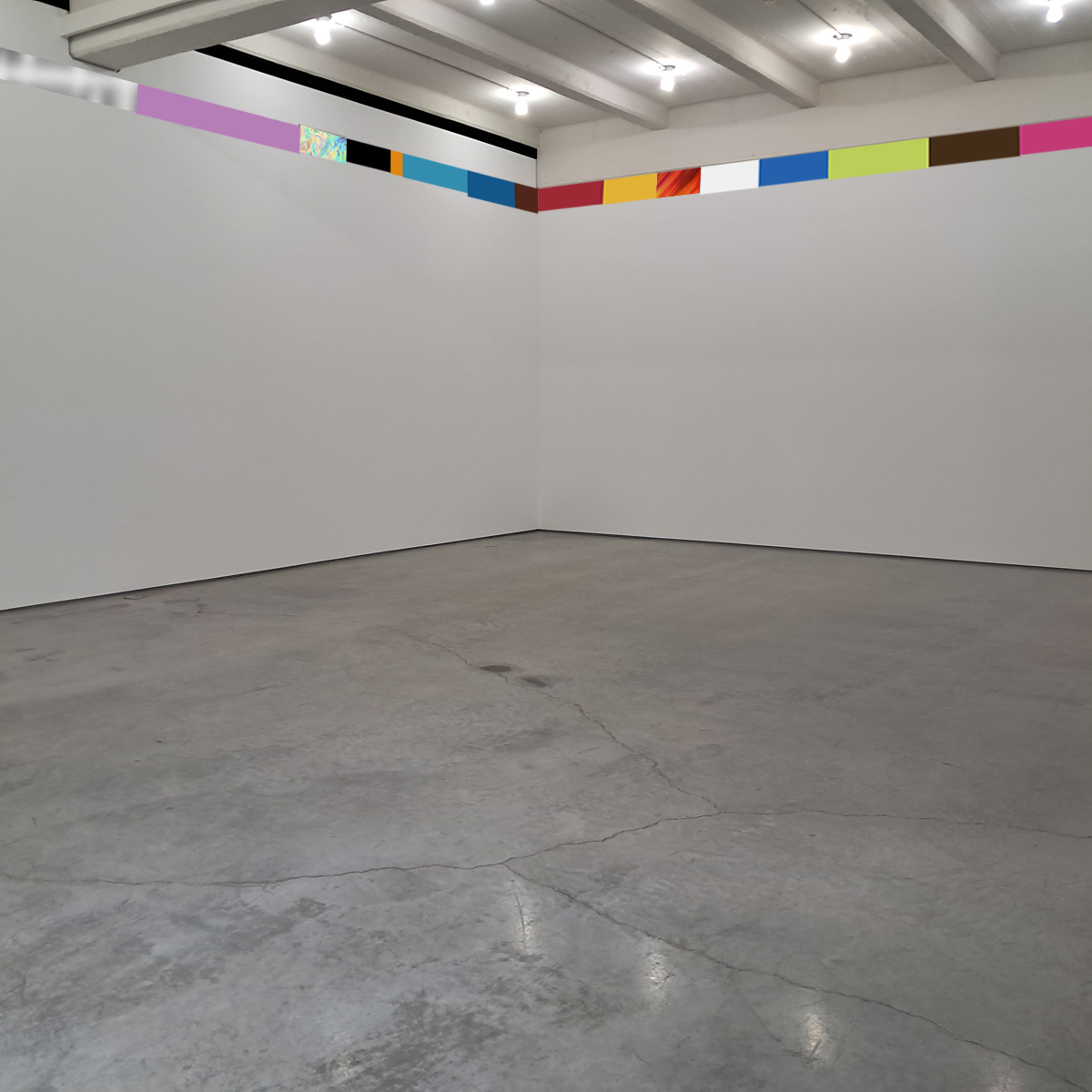 horizontal panorama of brightly colored strips of vinyl of random color and length spanning the entire length of the wall at the top in the corner where wall becomes ceiling in the art gallery by noah travis phillips
